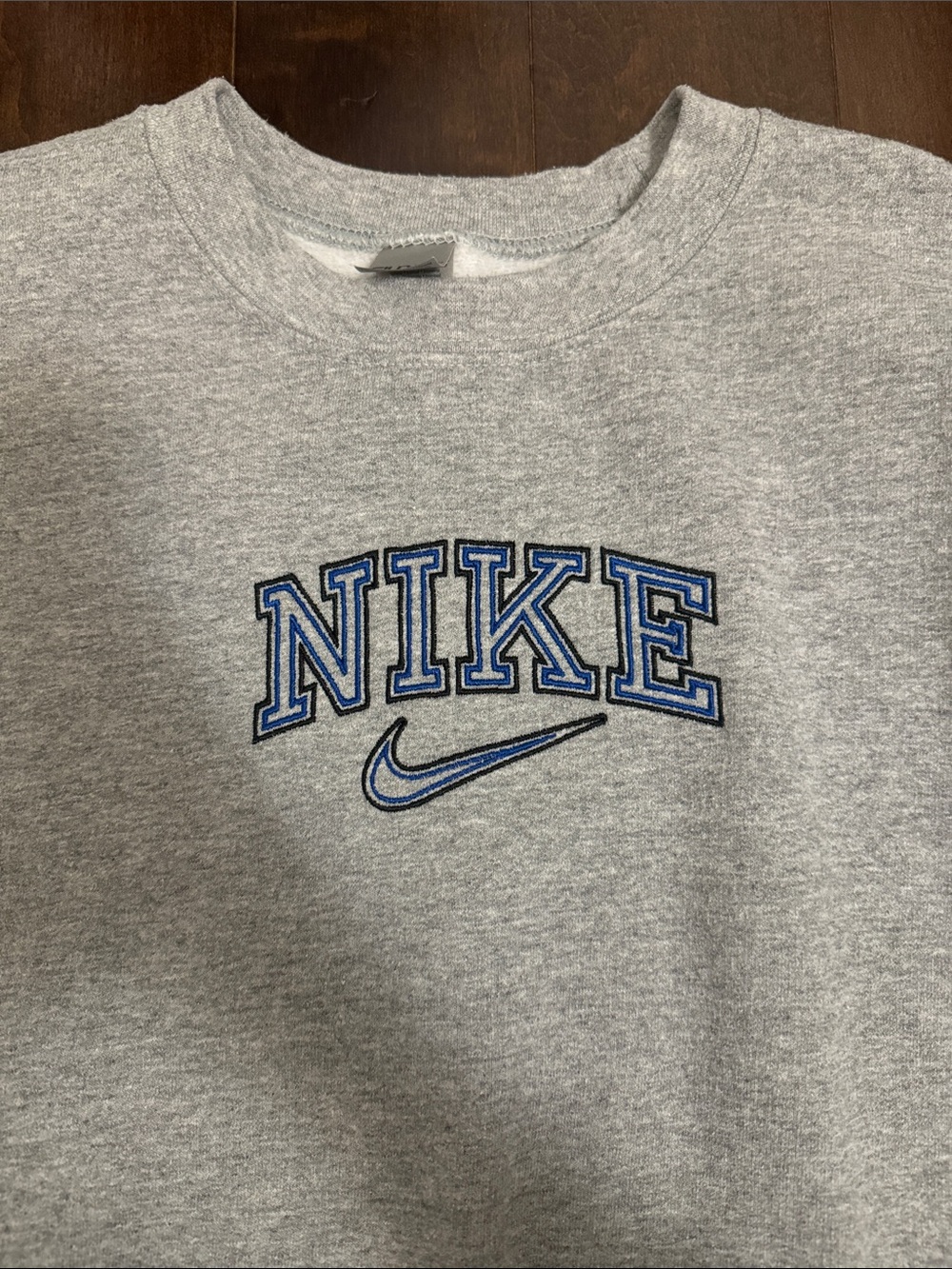Nike Gray Crewneck Sweatshirt with Blue Embroidered Logo
